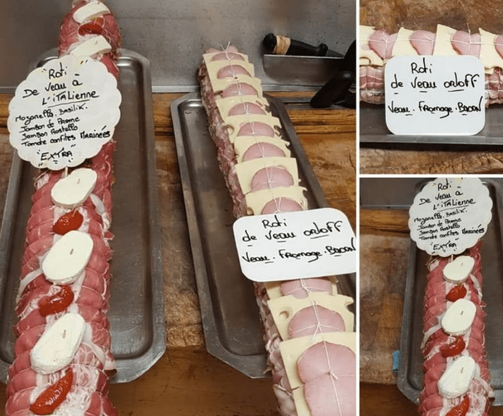 Rôti de veau artisanal préparé en boucherie-charcuterie à Vitry-sur-Seine avec fromage, jambon et garniture maison.